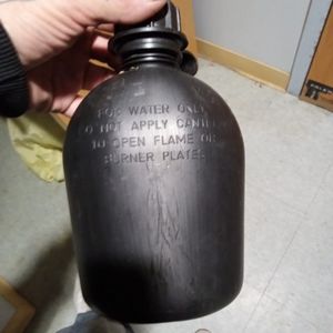 Military canteen with everything included,belt, holster,bowl,etc